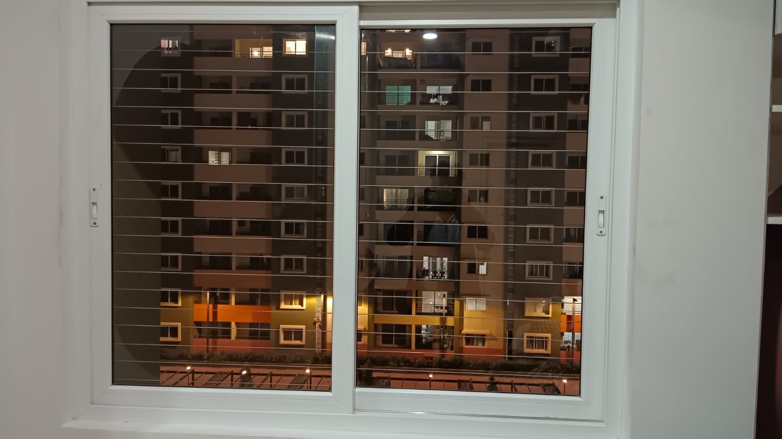 Balcony window safety net installed in a Visakhapatnam apartment